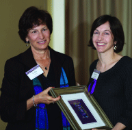 Hadassah Foundation board member Rachel Sheinbein (right) accepts the award from Celia Harms, chair of the board of Shalom Bayit. Photo courtesy of Shalom Bayit