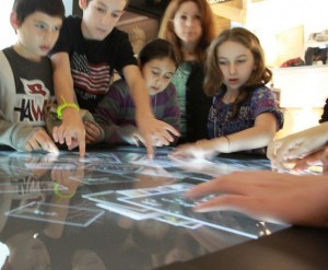 Kids at one of the museum's interactive stands.