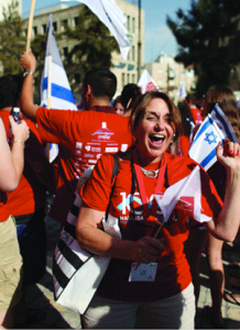 Delegates wave flags on Jaffa Road in Jerusalem.