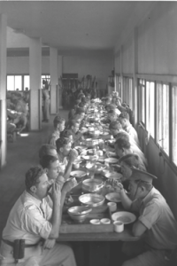 ‘The special night squad eat in the  dining hall at Kibbutz Ein Harod,’ 1938.  Courtesy of The Government Press Office, Israel.