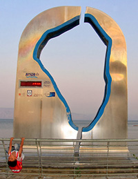 A sculpture along the lake records the Kinneret's water level. Photo by Esther Hecht.