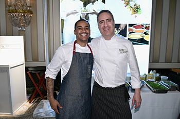 Chefs Joseph Johnson (left) and Itzik Mizrachi Barak at the Taste of Waldorf Astoria at Waldorf Astoria Hotel. Photo by Bryan Bedder/Getty Images for Waldorf Astoria Hotels & Resorts.