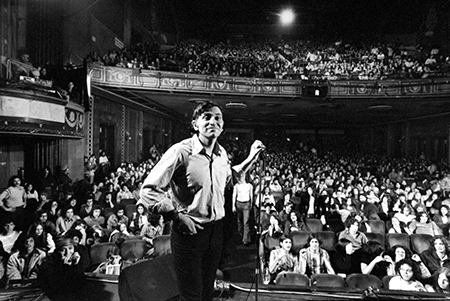 Rock promoter Bill Graham onstage w. audience visible, at Fillmore East. (Photo by John Olson/The LIFE Picture Collection/Getty Images)